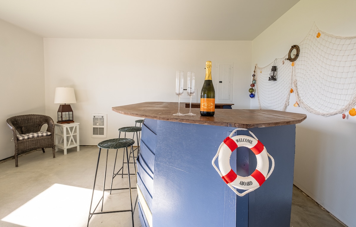 Nautical-themed bar and game room